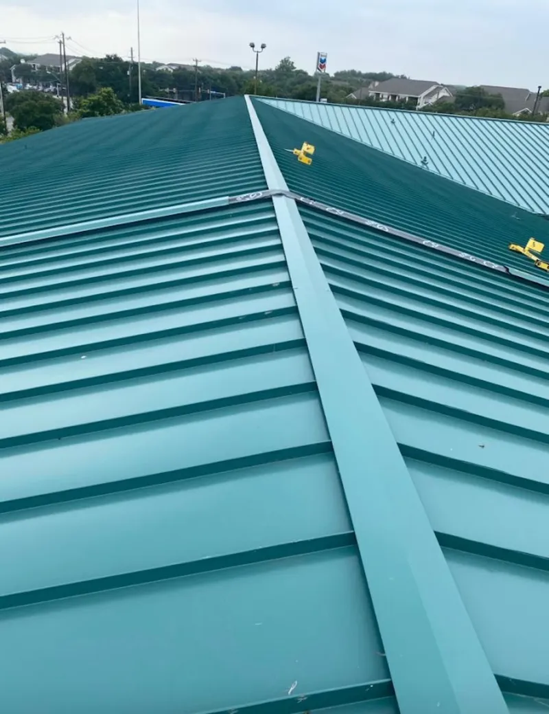 Green commercial metal roof ridge and valley for Metal Roof Repair in Youngtown