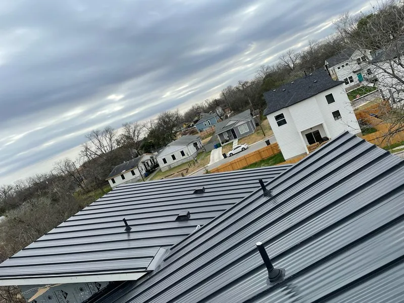 Standing seam metal roof panels with vents for Skylight Repair in Youngtown